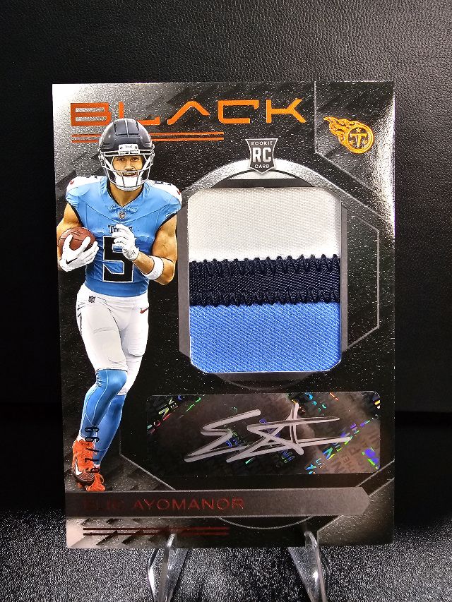 2025 Panini 2025 Panini Black - Rookie Patch Autographs Royal Elic Ayomanor